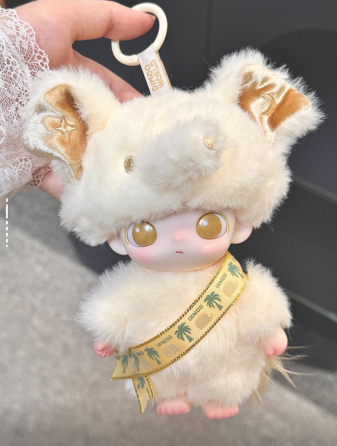 POP MART Dimoo, a trendy plush toy, offers companionship and comfort.